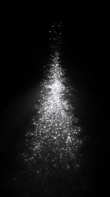 Glittering particle plume forms luminous abstract tree