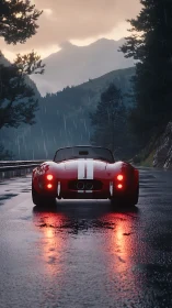Red sports car on wet mountain road at dusk in rain.