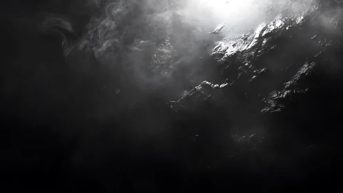 High contrast light reflects on wet textured dark surface