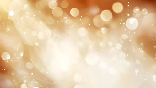 Warm golden bokeh light abstract background with soft glow.