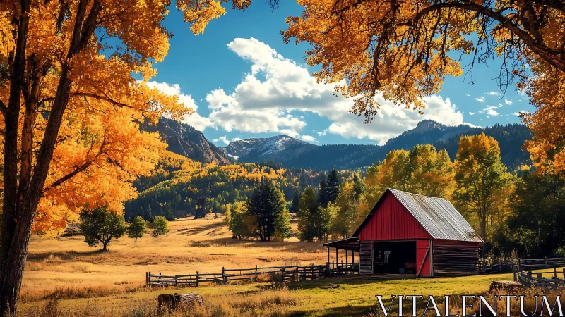 Rural barn in autumn valley with trees and distant mountains.
