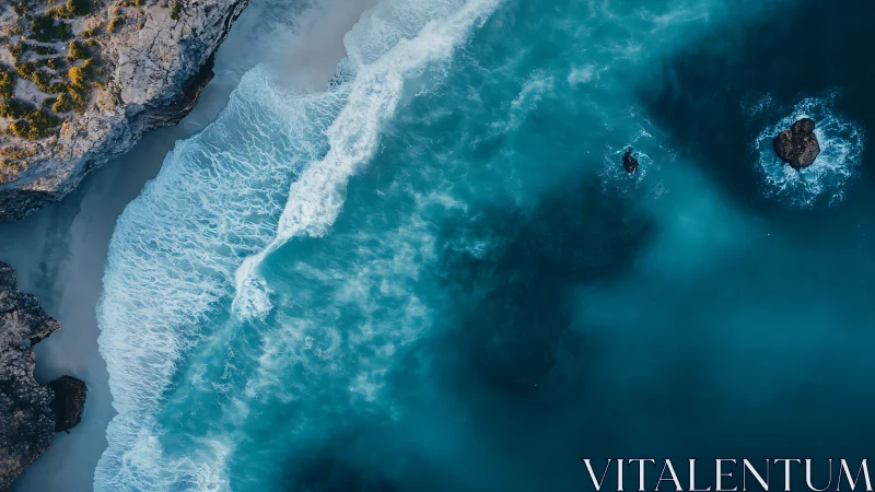Coastal cliffs meet turquoise surf in dynamic aerial seascape