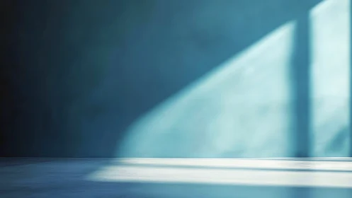 Light from an unseen window forms diagonal beam on wall