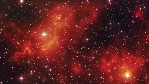 Glowing red nebula cradling bright stars in a quiet cosmos.
