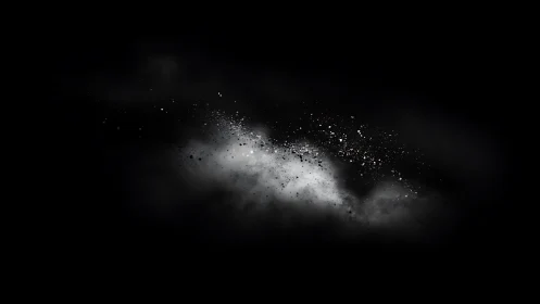 Isolated black and white particle cloud on dark field.