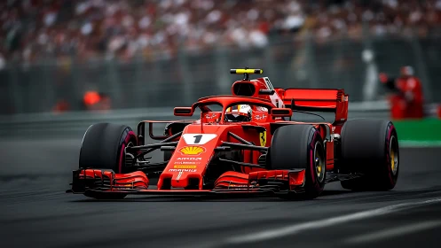 Red Formula 1 race car on circuit during high speed run.