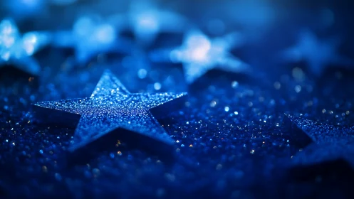 Glittering blue stars shimmer gently in dreamy bokeh light