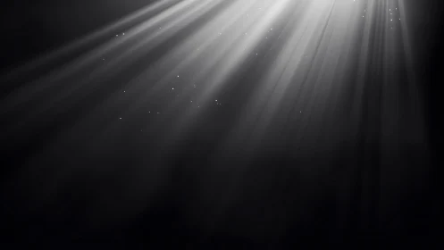 Soft starlit rays drifting through a calm midnight hush.