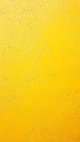Textured chromatic study of yellow plaster wall surface.