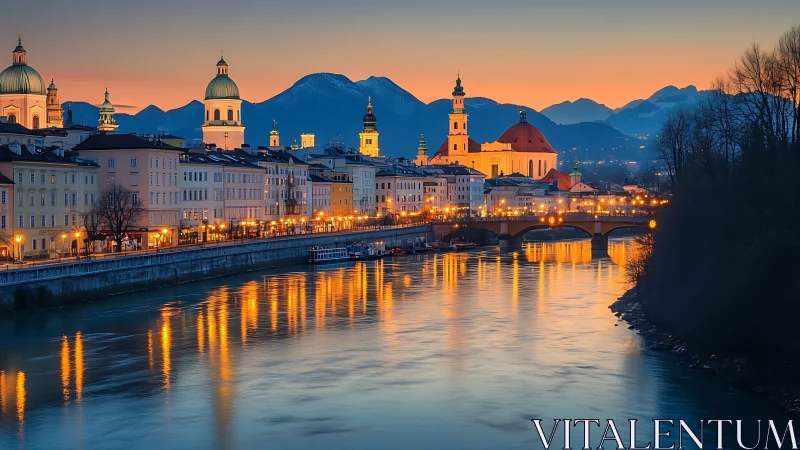Riverside European city at dusk with glowing reflections.