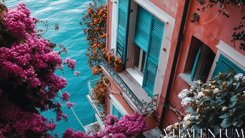 Seaside building facade with shutters and dense flowering plants.