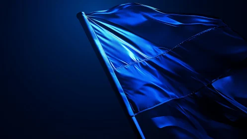 Monochrome blue flag under directional light on dark field.