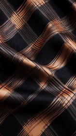 Copper plaid fabric shows diagonal folds under soft lighting