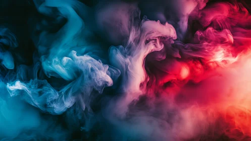 Dreamy swirling clouds of blue and red abstract color play.
