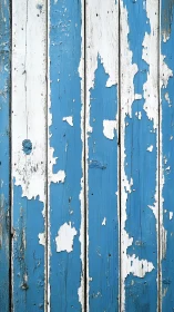 Weathered blue and white vertical wooden panels surface.