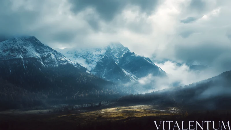 Storm-lit alpine mountains rise through brooding morning mist