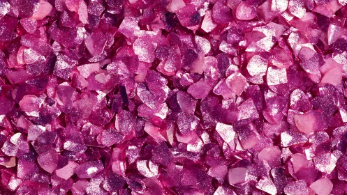 Glittering raspberry shards tumble into a sugar-bright sea