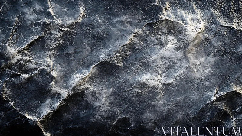 Abstract textured stone surface with cool tones and dramatic lighting.