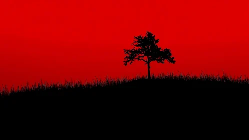 Solitary tree silhouette on vivid scarlet horizon line.