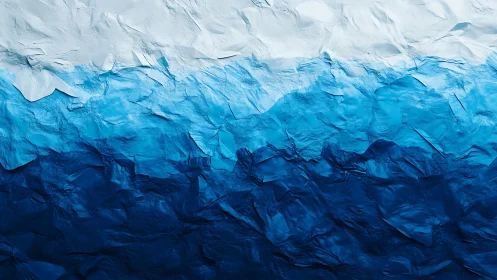 Layered blue waves of textured paint in soothing motion.