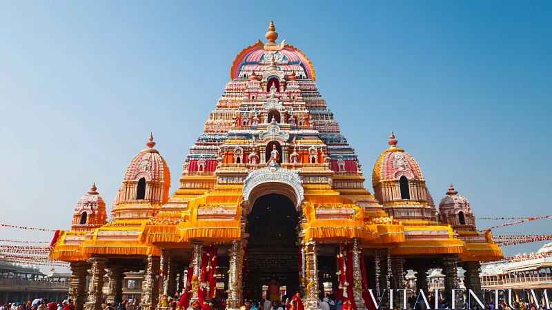 Colorful Hindu temple shikhara rises over festive courtyard.