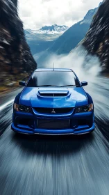 Blue rally car charging through misty mountain canyon road.