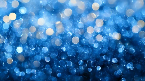 Defocused blue bokeh field renders luminous circular highlights