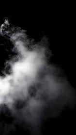 White vapor plume rises diagonally against black background