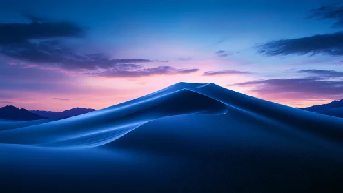 Serene blue sand dunes rest under a glowing twilight sky