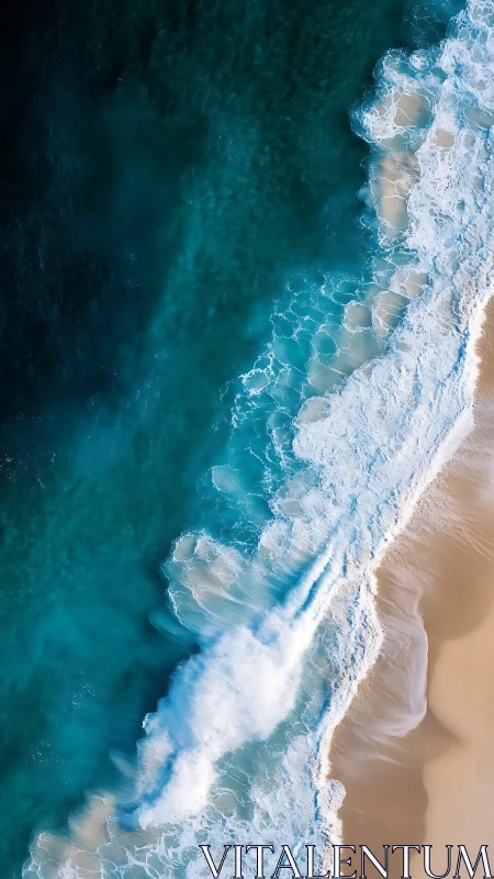 Tumbling teal breakers sketch bright ribbons across sand