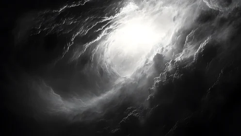 Volumetric luminance vortex within turbulent monochrome cloudfield.