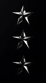 Three chrome stars aligned on black background.