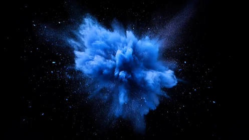 Electric cobalt powder burst suspended in deep black space.