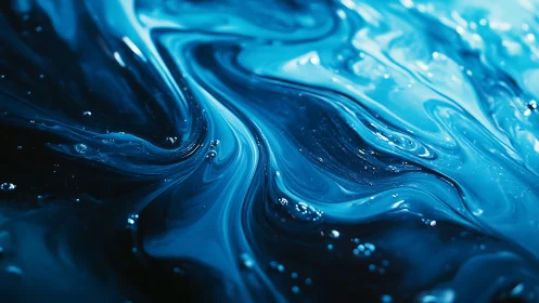 Blue liquid surface with flowing swirls and air bubbles.