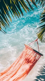 Coral hammock hangs over turquoise shoreline in high-sun light