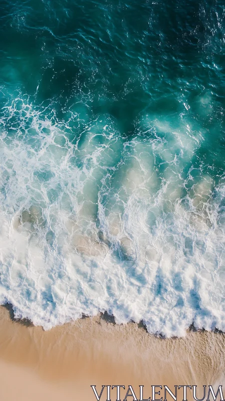 Turquoise waves roll onto soft sand in a tranquil seascape.
