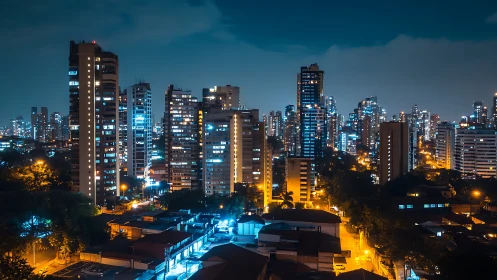 Vibrant high rise skyline glows against a calm night sky