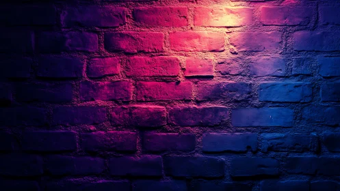 Neon magenta and cyan light washing textured brick wall.