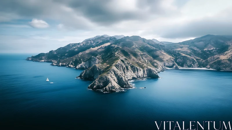 Rugged Peninsula Rises From Sapphire Waters Below