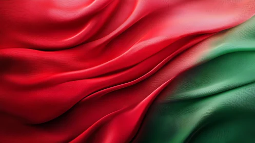 Silky red and green fabric waves flow in soft abstract motion