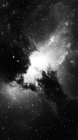 Monochrome star field with bright central nebula region.