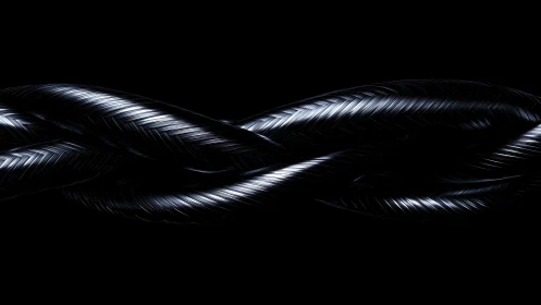 Intertwined metallic strands on black background in profile.