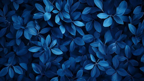 Monochrome blue foliage pattern with layered leaf textures.
