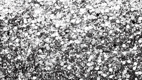 Dense silver glitter confetti background surface pattern.