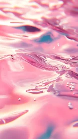 Glossy pink liquid surface with ripples and bubbles.
