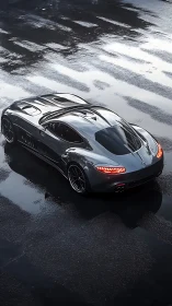 Silver supercar glides over rain-soaked asphalt surface.