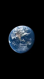 Earth from deep space shows illuminated blue marble hemisphere.