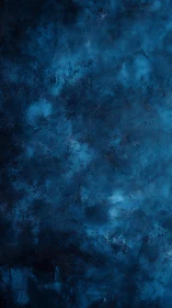 Textured blue abstract surface shows layered tonal variation