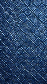 Deep blue quilted leather pattern with soft shimmering lines.
