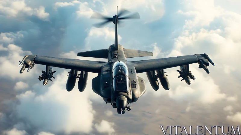 Armed military attack aircraft flying above soft clouds.